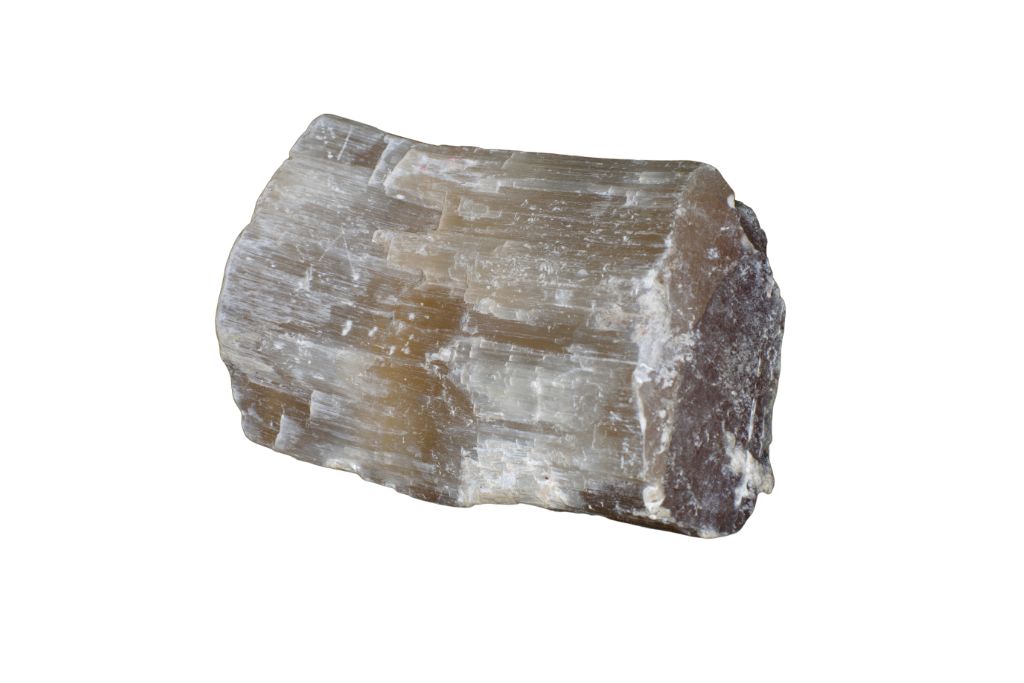 raw Selenite on a white background
