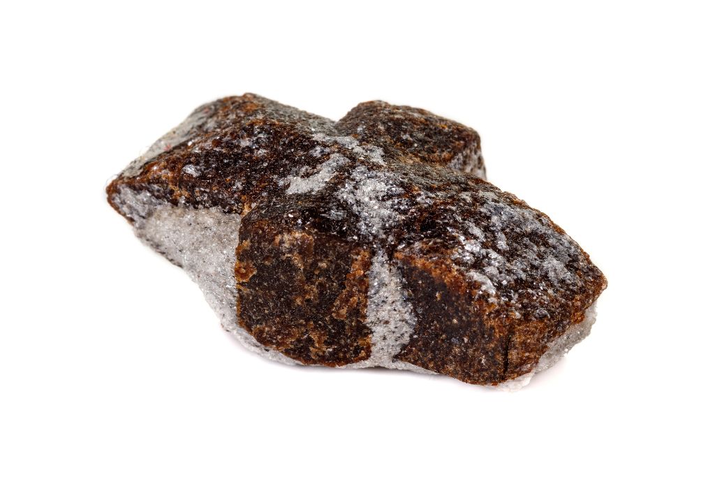 Staurolite on white background