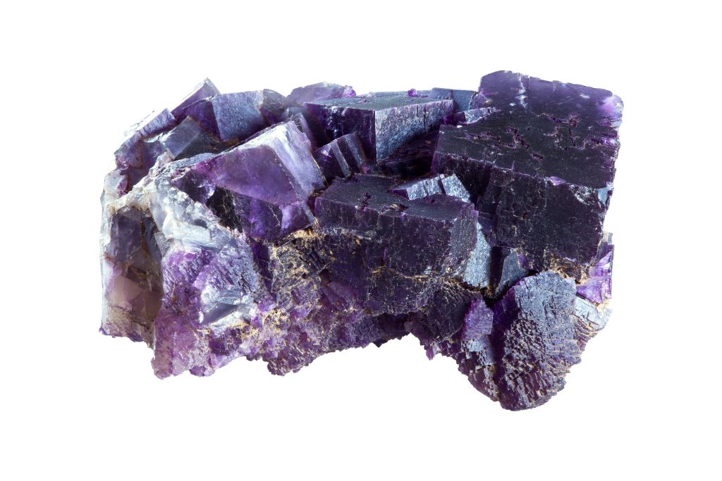 natural clustered cubic shaped Fluorite on a white background