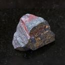 chunk of jaspilite on granite platform