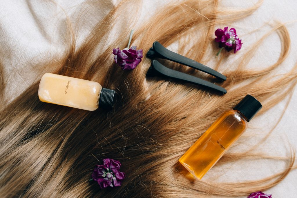 hair products laid on healthy hair