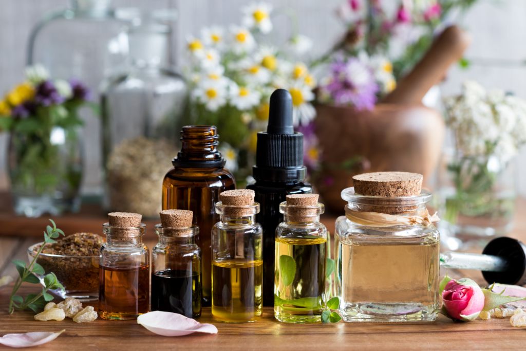 assorted bottles of oil on a table