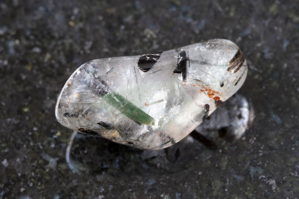 tourmalinated quartz on yellow platform