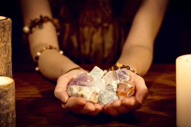 woman holding healing stones