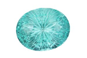 Paraiba Tourmaline on a white background x Facebook x John Dyer Gems